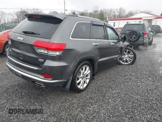 2015 Jeep Grand Cherokee Summit with VIN 1C4RJFJM6FC955904, listed as a IAAI auction lot 41483446 with 65,970 mi miles. Bid and sale history available at carsss.com. Image 4.