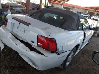 2001 Ford Mustang Deluxe с VIN 1FAFP44491F229968, выставлен на аукционе IAAI как лот 42304205 с пробегом 180 951 миль миль и . История ставок и продаж доступна на DreamBid. Изображение 4.