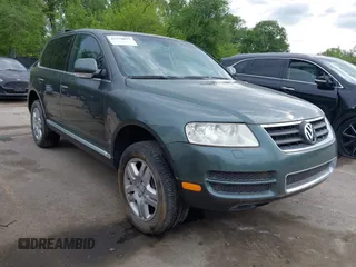 2004 Volkswagen Touareg with VIN WVGCM77L14D045663, listed as a IAAI auction lot 42170895 with 96,709 mi miles and . Bid and sale history available at DreamBid. Image 1.