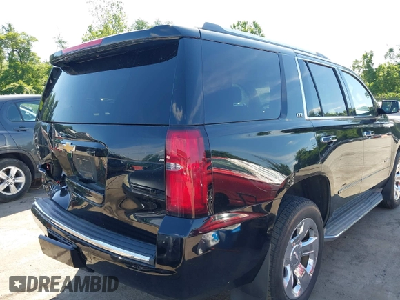 2015 Chevrolet Tahoe LTZ z VIN 1GNSKCKC3FR104845, wystawiony jako IAAI lot #42291785 z przebiegiem 75 047 mil mil oraz . Historia ofert i sprzedaży dostępna na DreamBid. Obrazek 18.