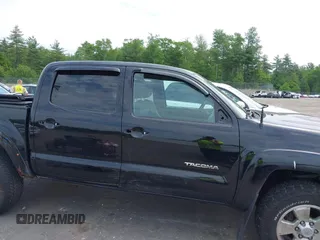 2013 Toyota Tacoma with VIN 3TMLU4EN4DM117239, listed as a IAAI auction lot 42494359 with 239,635 mi miles and . Bid and sale history available at DreamBid. Image 14.