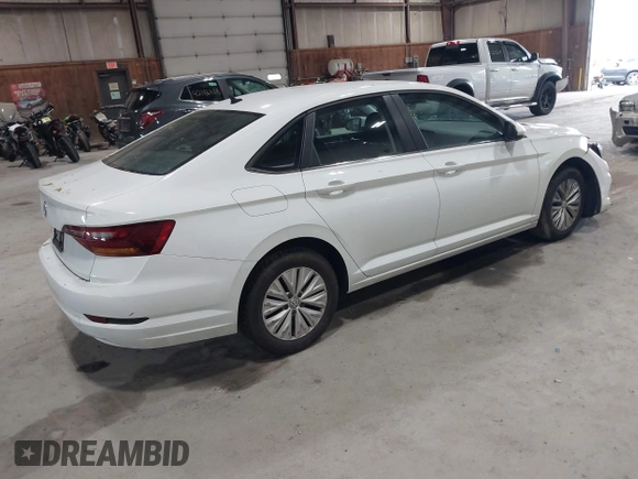 2019 Volkswagen Jetta S z VIN 3VWC57BU6KM129512, wystawiony jako IAAI lot #42205228 z przebiegiem 92 940 mil mil oraz . Historia ofert i sprzedaży dostępna na DreamBid. Obrazek 4.
