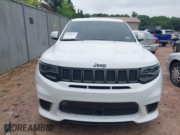 2021 Jeep Grand Cherokee Trackhawk with VIN 1C4RJFN95MC843131, listed as a IAAI auction lot 42688185 with 16,391 mi miles and . Bid and sale history available at DreamBid. Image 12.