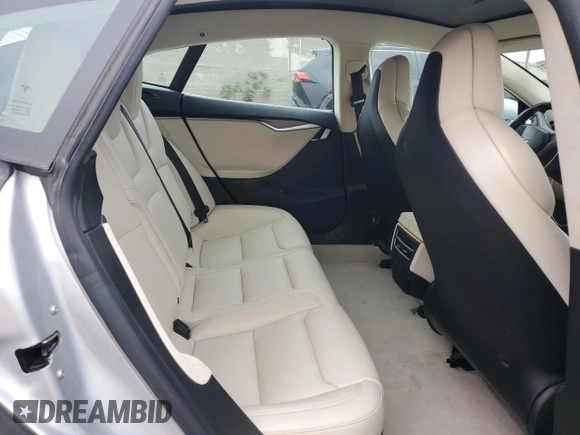 2018 Tesla Model S 75D z VIN 5YJSA1E25JF282919, wystawiony jako Copart lot #60255745 z przebiegiem 94 066 mil mil oraz Szkoda całkowita • Salvage title. Historia ofert i sprzedaży dostępna na DreamBid. Obrazek 11.