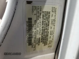 2007 Nissan Versa 1.8 S with VIN 3N1BC13E57L439319, listed as a Copart auction lot 72720894 with 103,738 mi miles and Salvage Title. Bid and sale history available at carsss.com. Image 12.