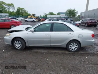2005 Toyota Camry STD z VIN 4T1BE32K45U562005, wystawiony jako IAAI lot #42354477 z przebiegiem 205 193 mil mil oraz . Historia ofert i sprzedaży dostępna na DreamBid. Obrazek 15.