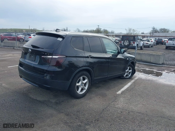 2011 BMW X3 28i with VIN 5UXWX5C59BL714770, listed as a IAAI auction lot 42044088 with 202,247 mi miles. Bid and sale history available at carsss.com. Image 4.