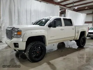 2015 GMC Sierra 1500 Denali with VIN 3GTU2WEJ3FG338044, listed as a Copart auction lot 50774205 with 111,691 mi miles and Salvage Title. Bid and sale history available at carsss.com. Image 1.