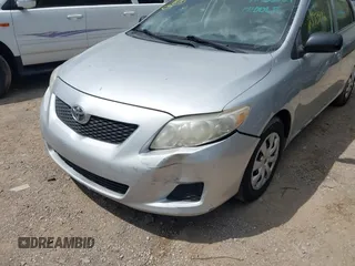 2009 Toyota Corolla with VIN JTDBL40E099041319, listed as a IAAI auction lot 42119698 with 205,666 mi miles. Bid and sale history available at carsss.com. Image 6.