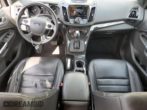 2015 Ford Escape Titanium with VIN 1FMCU0J99FUA16290, listed as a Copart auction lot 52496855 with 107,674 mi miles and Salvage Title. Bid and sale history available at DreamBid. Image 8.