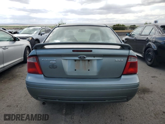 2005 Ford Focus S with VIN 1FAFP34N35W235922, listed as a Copart auction lot 54729854 with Not Provided miles and Salvage Title. Bid and sale history available at carsss.com. Image 6.
