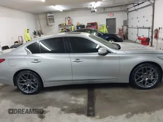 2014 Infiniti Q50 Sport with VIN JN1BV7AR0EM695972, listed as a IAAI auction lot 41732229 with 134,654 mi miles and . Bid and sale history available at DreamBid. Image 14.