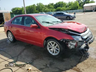 2012 Ford Fusion SEL with VIN 3FAHP0JA1CR348647, listed as a Copart auction lot 61761545 with 65,456 mi miles and Salvage title. Bid and sale history available at DreamBid. Image 4.
