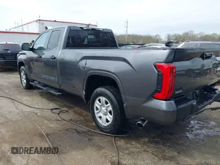 2023 Toyota Tundra with VIN 5TFKB5GDXPX002218, listed as a IAAI auction lot 41932719 with 71,335 mi miles and . Bid and sale history available at DreamBid. Image 3.