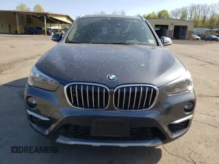 2018 BMW X1 xDrive28i with VIN WBXHT3C33J5K31838, listed as a Copart auction lot 48650943 with 63,064 mi miles. Bid and sale history available at carsss.com. Image 5.