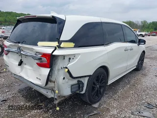 2019 Honda Odyssey Elite z VIN 5FNRL6H95KB104816, wystawiony jako IAAI lot #42232490 z przebiegiem 77 465 mil mil oraz . Historia ofert i sprzedaży dostępna na DreamBid. Obrazek 4.