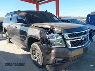 2016 Chevrolet Suburban LT with VIN 1GNSCHKC2GR243313, listed as a IAAI auction lot 40987642 with 164,757 mi miles. Bid and sale history available at carsss.com. Image 1.