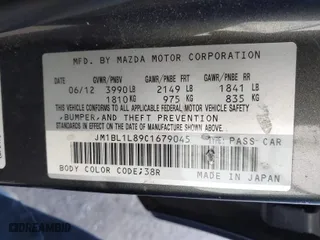 2012 Mazda Mazda3 i Touring with VIN JM1BL1L89C1679045, listed as a IAAI auction lot 42001894 with 151,233 mi miles. Bid and sale history available at carsss.com. Image 9.