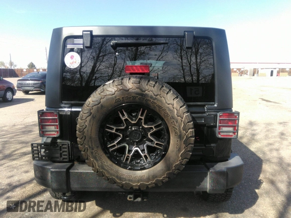 2018 Jeep Wrangler Unlimited Sport S with VIN 1C4BJWDGXJL811661, listed as a IAAI auction lot 42002611 with 86,105 mi miles and . Bid and sale history available at DreamBid. Image 16.