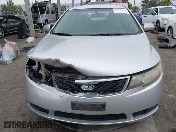 2013 Kia Forte LX with VIN KNAFT4A21D5739585, listed as a IAAI auction lot 42097213 with 195,500 mi miles. Bid and sale history available at carsss.com. Image 13.