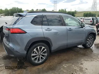 2023 Toyota Corolla Cross XLE with VIN 7MUDAAAG8PV055275, listed as a Copart auction lot 62363375 with 26,106 mi miles and Salvage title. Bid and sale history available at DreamBid. Image 3.