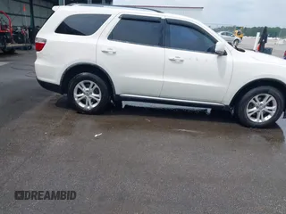 2012 Dodge Durango Crew with VIN 1C4RDHDG9CC152766, listed as a IAAI auction lot 42038931 with 288,545 mi miles and . Bid and sale history available at DreamBid. Image 13.