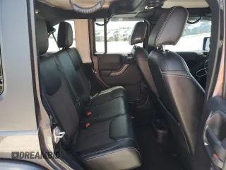2016 Jeep Wrangler Unlimited Freedom с VIN 1C4BJWDG4GL153134, выставлен на аукционе Copart как лот 57954635 с пробегом 105 250 миль миль и Списание • Salvage title. История ставок и продаж доступна на DreamBid. Изображение 11.