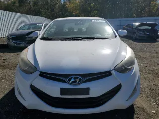 2013 Hyundai Elantra Coupe GS PZEV with VIN KMHDH6AE3DU016159, listed as a Copart auction lot 76408194 with 0 mi miles and Salvage Title. Bid and sale history available at carsss.com. Image 5.