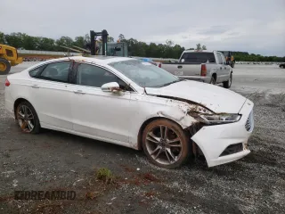 2016 Ford Fusion Titanium with VIN 3FA6P0K90GR110354, listed as a Copart auction lot 58849025 with 148,662 mi miles and Salvage title. Bid and sale history available at DreamBid. Image 4.