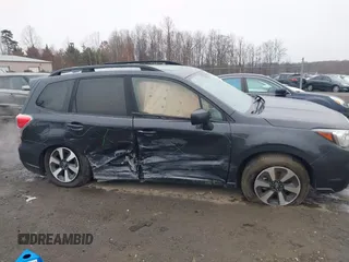 2017 Subaru Forester Premium with VIN JF2SJAEC9HG505912, listed as a IAAI auction lot 41165598 with 116,435 mi miles. Bid and sale history available at carsss.com. Image 13.