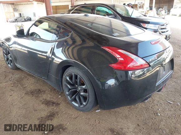 2015 Nissan 370Z Sport with VIN JN1AZ4EH3FM442775, listed as a IAAI auction lot 41960249 with 125,780 mi miles and . Bid and sale history available at DreamBid. Image 3.