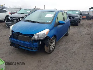 2013 Toyota Yaris L with VIN JTDKTUD30DD553855, listed as a IAAI auction lot 41485101 with 83,546 mi miles. Bid and sale history available at carsss.com. Image 2.