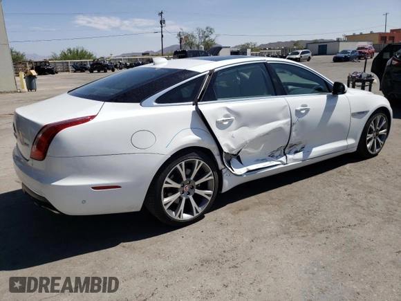 2019 Jaguar XJ Portfolio with VIN SAJWA2G72K8W21087, listed as a Copart auction lot 66017344 with 22,671 mi miles and Salvage Title. Bid and sale history available at DreamBid. Image 3.