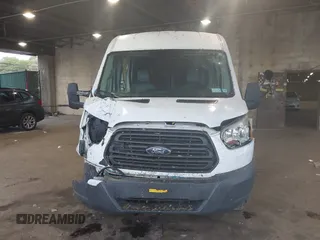 2015 Ford Transit Cargo z VIN 1FTNR2CM1FKA40154, wystawiony jako IAAI lot #42210986 z przebiegiem 164 324 mil mil oraz . Historia ofert i sprzedaży dostępna na DreamBid. Obrazek 12.