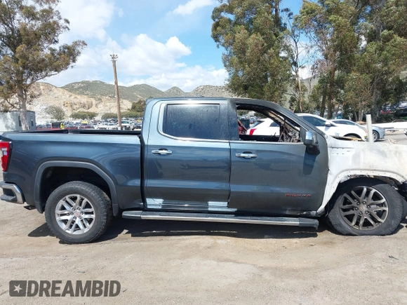 2019 GMC Sierra 1500 SLT z VIN 3GTP8DED1KG229179, wystawiony jako IAAI lot #41932481 z przebiegiem Nie podano mil oraz . Historia ofert i sprzedaży dostępna na DreamBid. Obrazek 13.