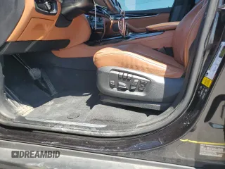 2016 BMW X5 xDrive50i с VIN 5UXKR6C58G0J81186, выставлен на аукционе Copart как лот 56649005 с пробегом 108 049 миль миль и Списание • Salvage title. История ставок и продаж доступна на DreamBid. Изображение 13.