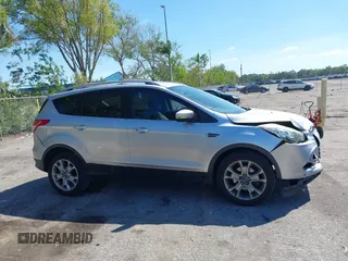 2016 Ford Escape Titanium with VIN 1FMCU0JX2GUC39416, listed as a IAAI auction lot 41793375 with 146,877 mi miles. Bid and sale history available at carsss.com. Image 13.