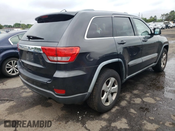 2011 Jeep Grand Cherokee Laredo with VIN 1J4RR4GG1BC737808, listed as a Copart auction lot 61305565 with 188,067 mi miles and Clean title. Bid and sale history available at DreamBid. Image 3.