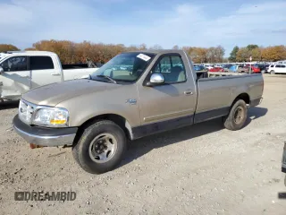 1999 Ford F-150 XL z VIN 1FTRF17L2XKA36749, wystawiony jako Copart lot #84671444 z przebiegiem 148 338 mil mil oraz Szkoda całkowita • Salvage title. Historia ofert i sprzedaży dostępna na DreamBid. Obrazek 1.