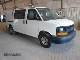 2013 Chevrolet Express Cargo Van with VIN 1GCWGFCA0D1156858, listed as a IAAI auction lot 42095785 with 223,413 mi miles. Bid and sale history available at carsss.com. Image 1.