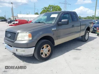 2004 Ford F-150 XLT with VIN 1FTPX14574NA33950, listed as a IAAI auction lot 41966655 with 160,523 mi miles. Bid and sale history available at carsss.com. Image 2.