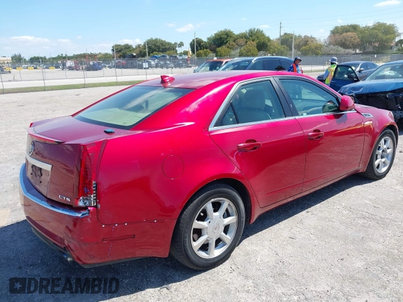 2009 Cadillac CTS RWD w/1SA with VIN 1G6DF577290142964, listed as a IAAI auction lot 42017475 with 171,696 mi miles. Bid and sale history available at carsss.com. Image 4.