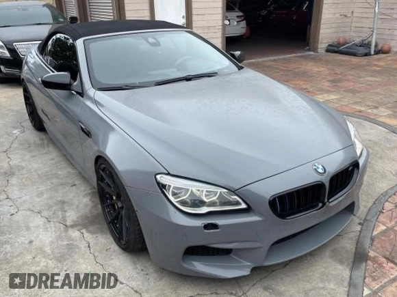 2016 BMW M6 z VIN WBS6G9C54GD932196, wystawiony jako Copart lot #53960063 z przebiegiem 46 162 mil mil oraz . Historia ofert i sprzedaży dostępna na DreamBid. Obrazek 1.