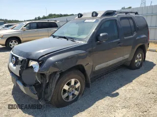 2011 Nissan Xterra Pro-4X with VIN 5N1AN0NW2BC503027, listed as a Copart auction lot 62361285 with 113,568 mi miles and Salvage title. Bid and sale history available at DreamBid. Image 1.