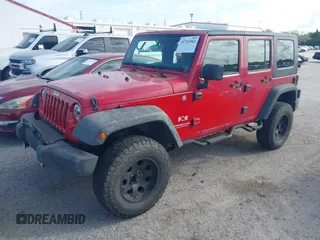2007 Jeep Wrangler Unlimited X with VIN 1J4GA39197L171132, listed as a IAAI auction lot 41716963 with 145,442 mi miles and . Bid and sale history available at DreamBid. Image 2.