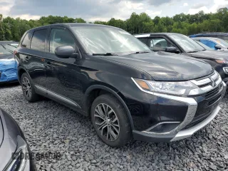2018 Mitsubishi Outlander ES with VIN JA4AZ3A38JJ003397, listed as a Copart auction lot 65732075 with 64,768 mi miles and Salvage title. Bid and sale history available at DreamBid. Image 4.