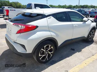 2021 Toyota C-HR LE with VIN JTNKHMBX8M1104427, listed as a IAAI auction lot 41948234 with 24,415 mi miles. Bid and sale history available at carsss.com. Image 4.