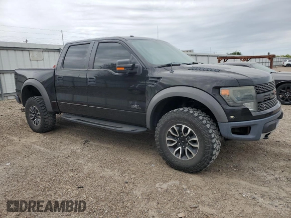 2014 Ford F-150 SVT Raptor with VIN 1FTFW1R60EFA82287, listed as a Copart auction lot 52150635 with 157,556 mi miles and Salvage Title. Bid and sale history available at carsss.com. Image 4.