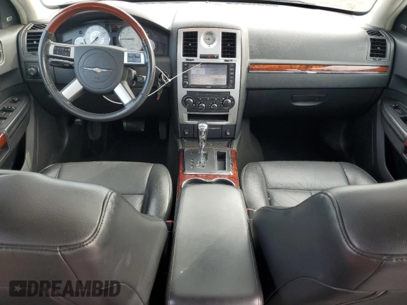 2009 Chrysler 300 with VIN 2C3LK33V19H614083, listed as a Copart auction lot 77529014 with 188,125 mi miles and Salvage title. Bid and sale history available at DreamBid. Image 8.