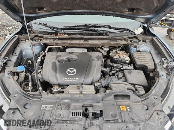 2015 Mazda CX-5 Sport with VIN JM3KE2BE3F0488309, listed as a Copart auction lot 63688835 with 121,775 mi miles and Clean title. Bid and sale history available at DreamBid. Image 12.